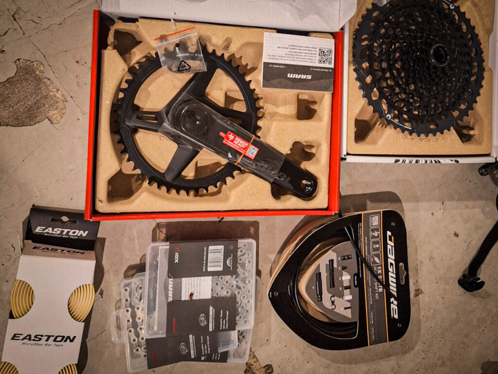 Unboxed SRAM crank, chainring, cassette, and chain for a full drivetrain replacement